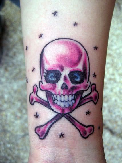 skull and crossbones tattoo Pretty pink skull and crossbones tattoo
