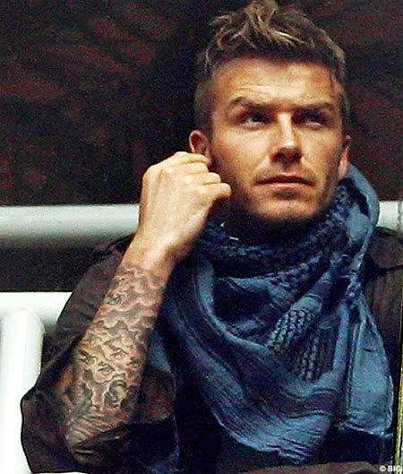 David Beckham, clouds tattoo on arm